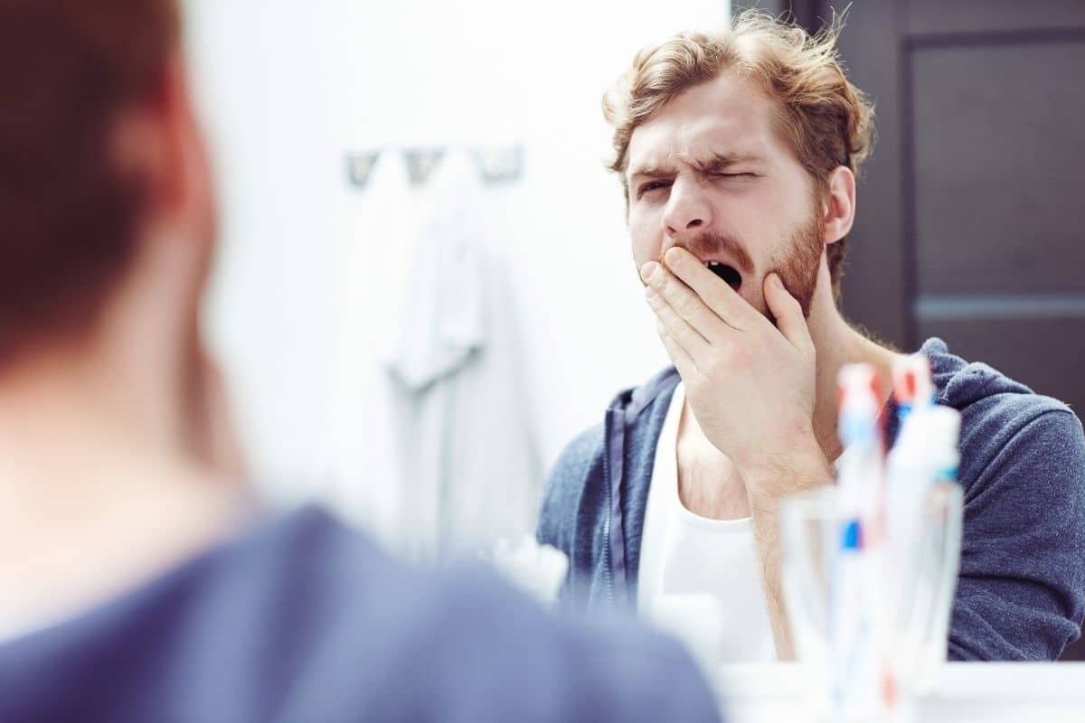 Man looking worried about morning breath