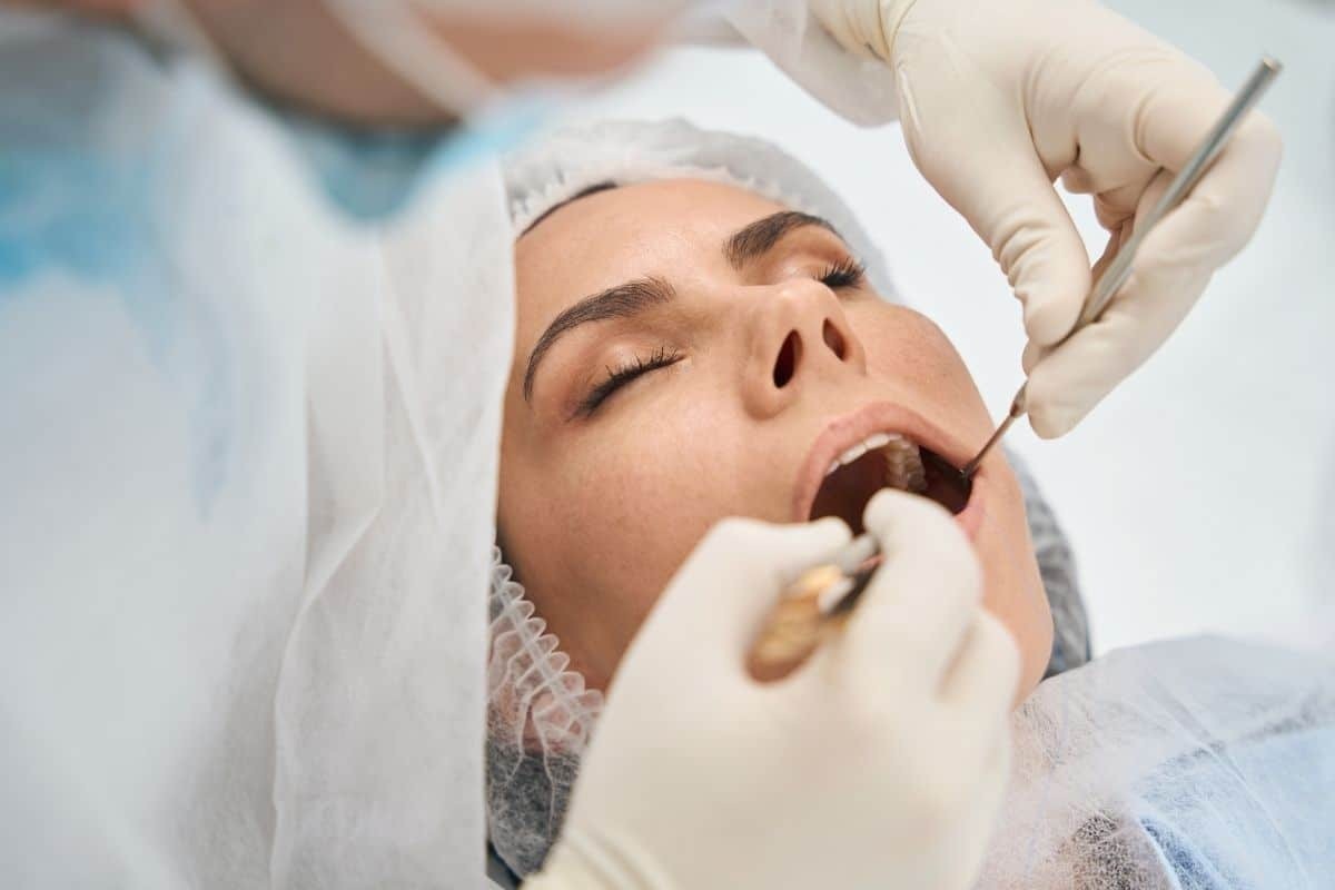 women having dental crown checkup